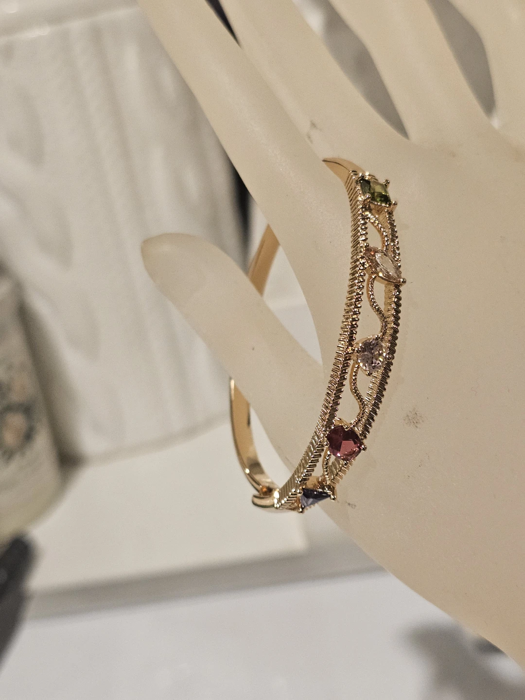 Gold tone bangle bracelet with colourful stones - photo 4