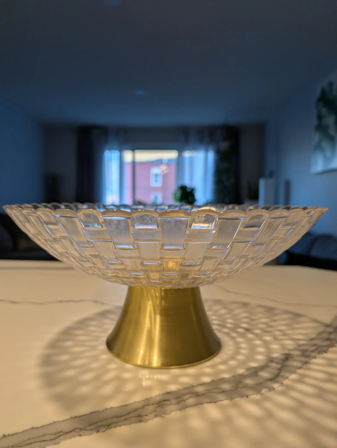 Clear glass and gold pedestal fruit bowl