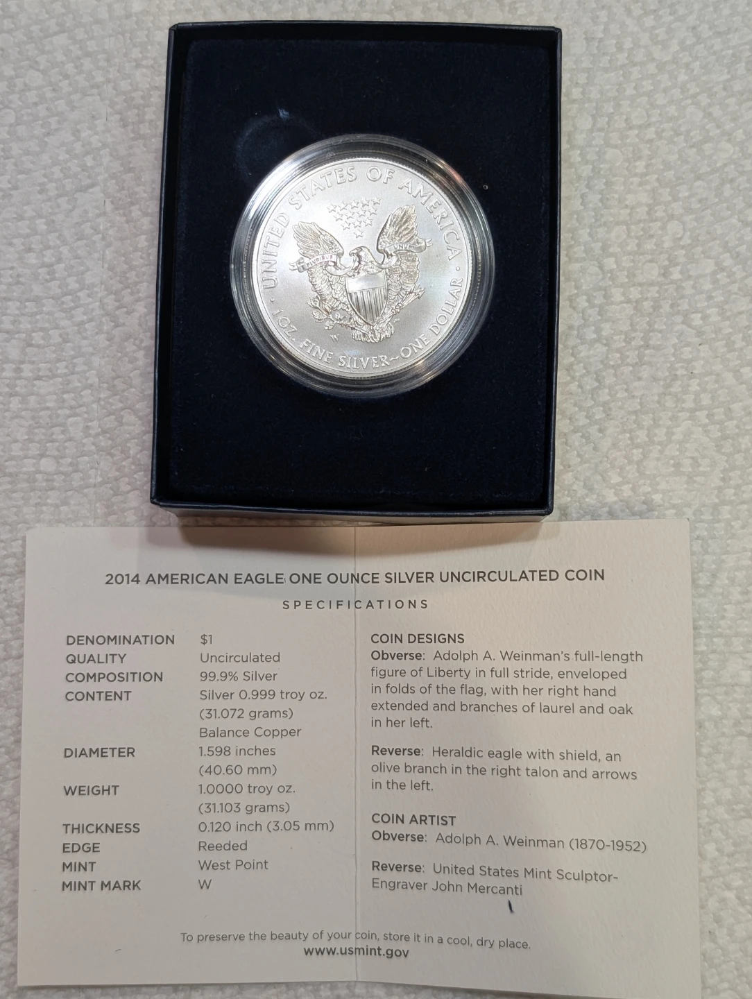 2014 American Eagle One Ounce Silver Uncirculated Coin - photo 3