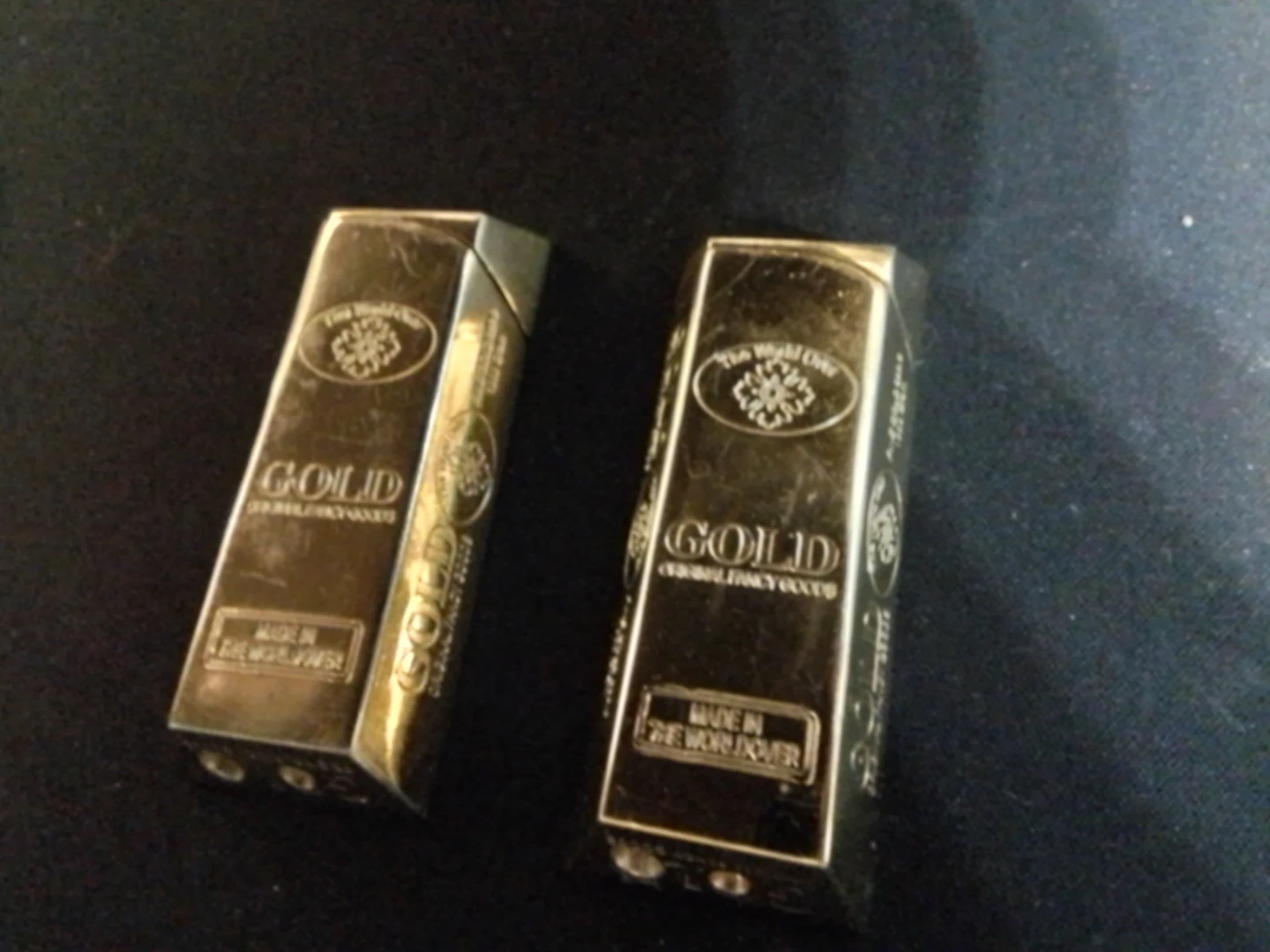 The World Over Gold Bar Lighters Fancy Goods Spark Pair