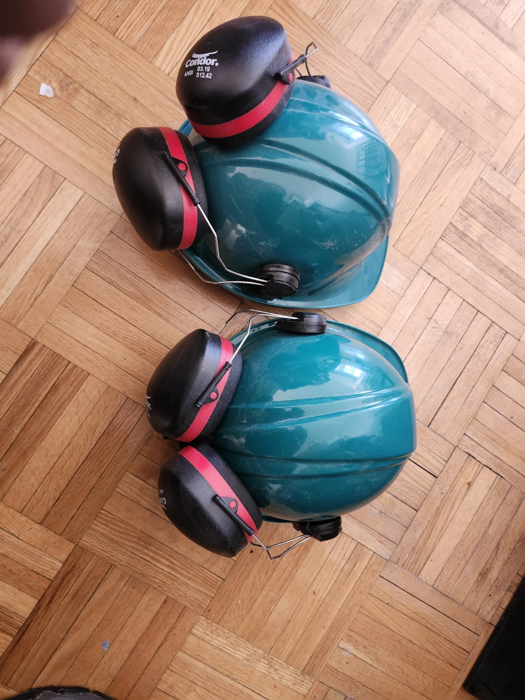 Two Condor Hard Hats with Earmuffs