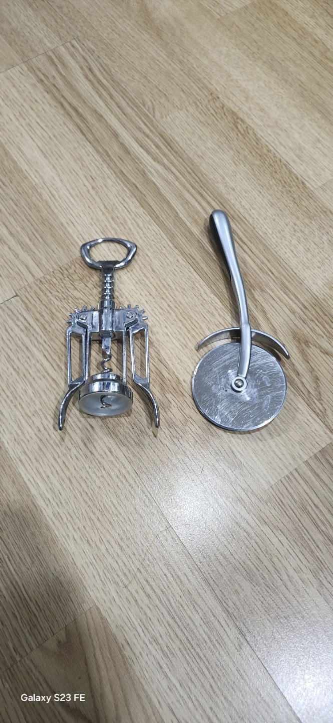 Wine Opener and Pizza Cutter. Excellent condition price firm