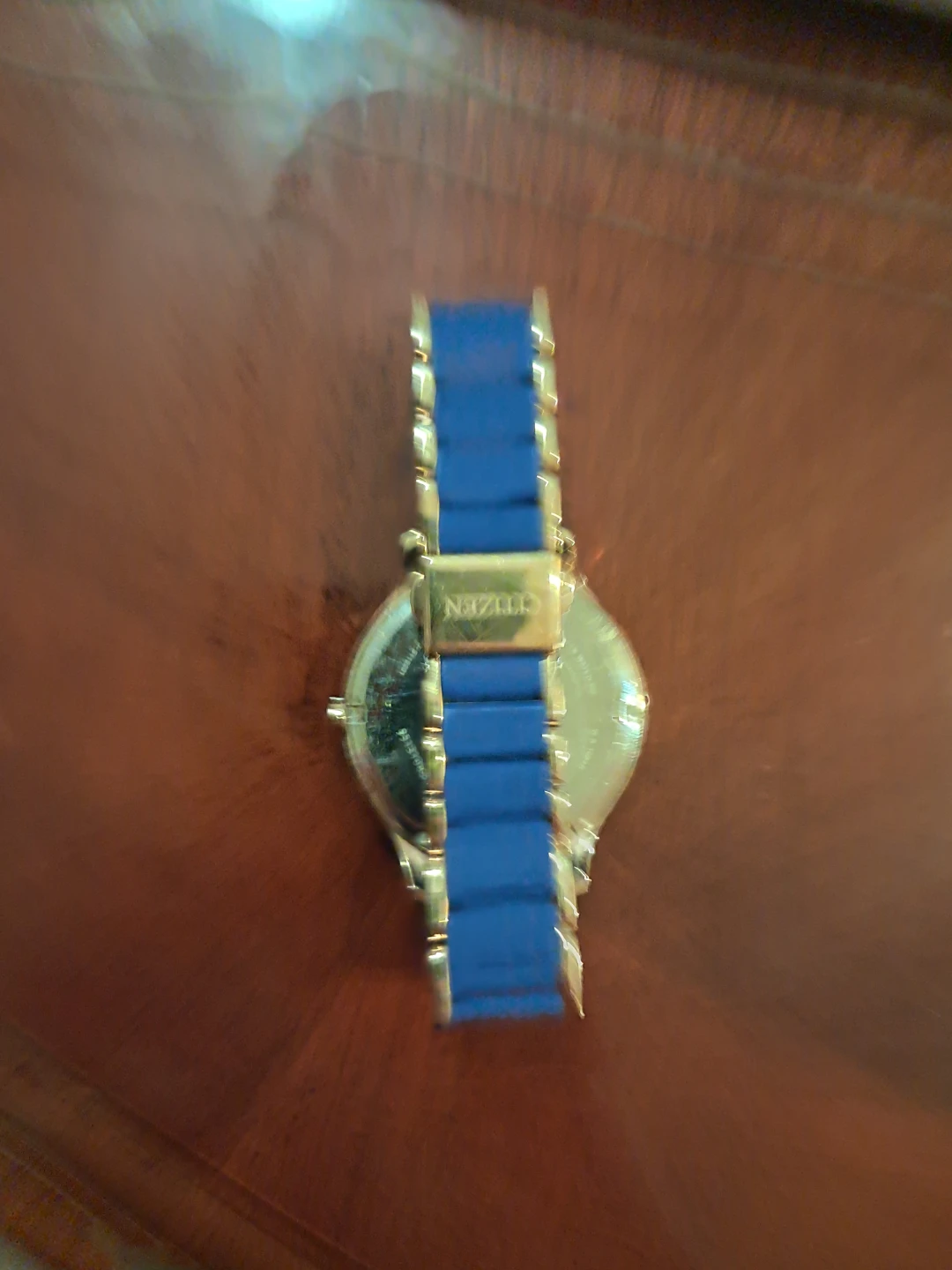 Citizen Eco Drive watch in rose gold with blue silicone bracelet - photo 2