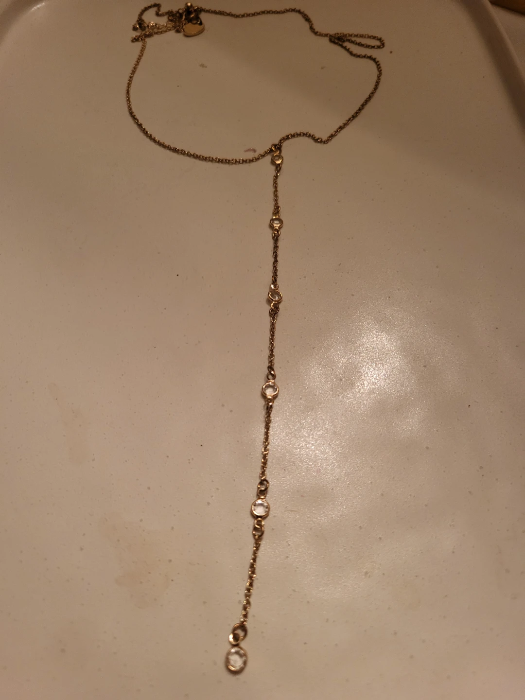Gold-tone necklace with clear crystals