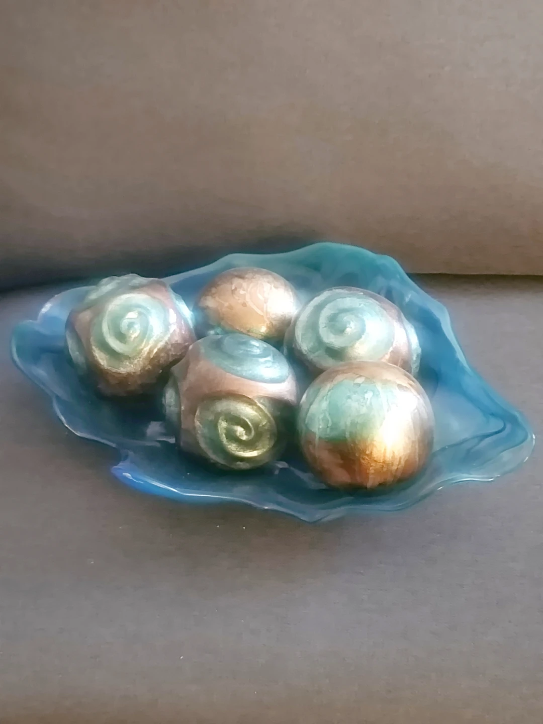Decorative Orbs in Blue Glass Dish