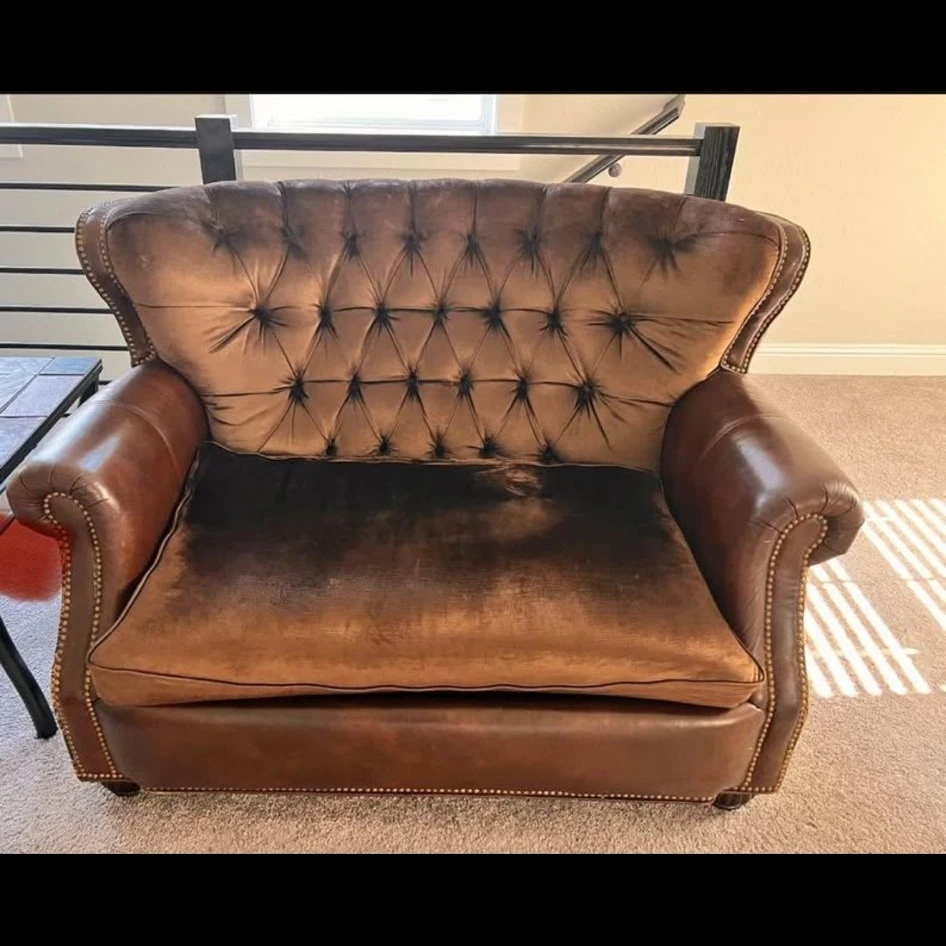 Brown Tufted Armchair with Decorative Back