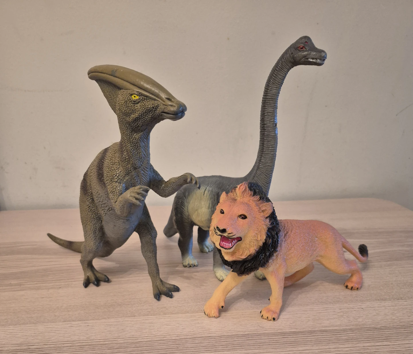 Toy Dinosaur and Lion Figures 🥕