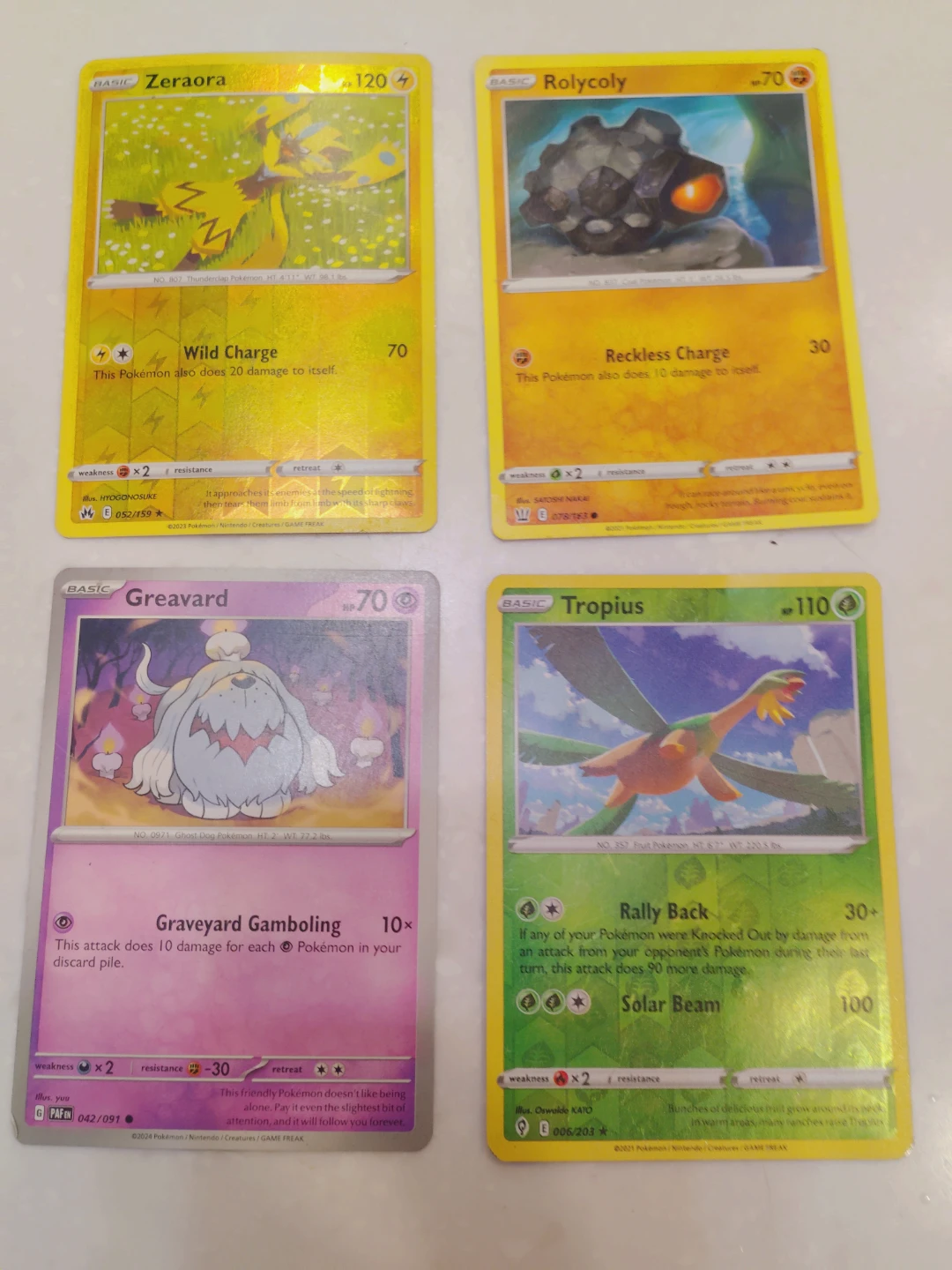 Pokemon Trading Cards - Zeraora, Rolycoly, Greavard, Tropius