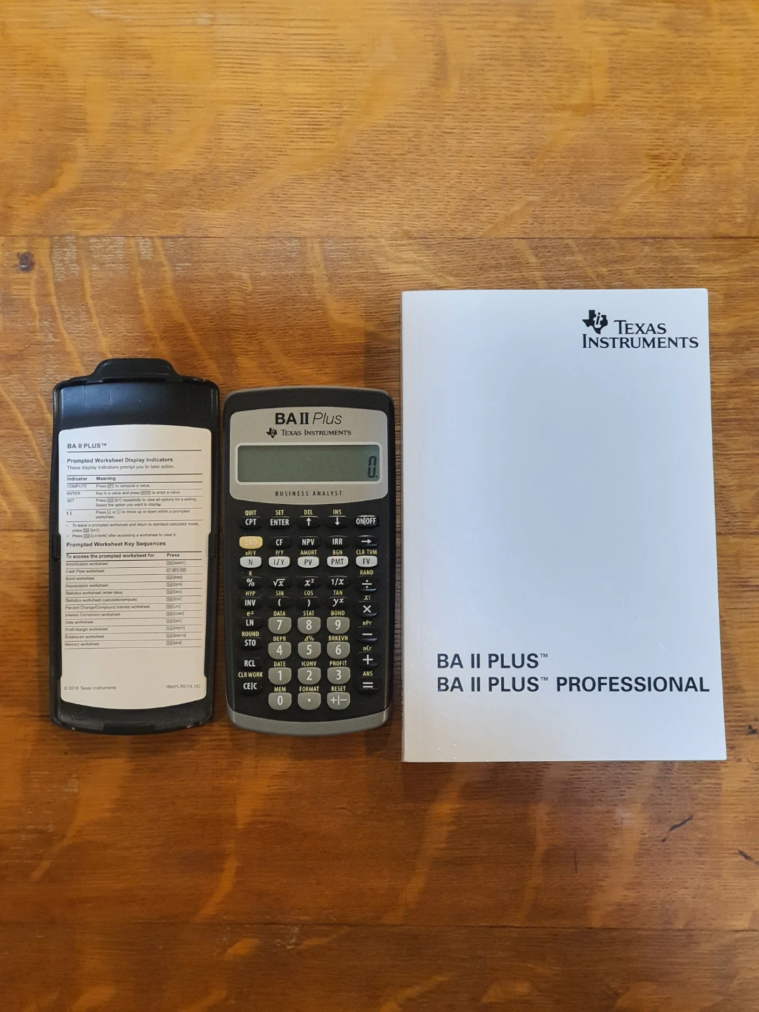 Texas Instruments BA II Plus Calculator with manual