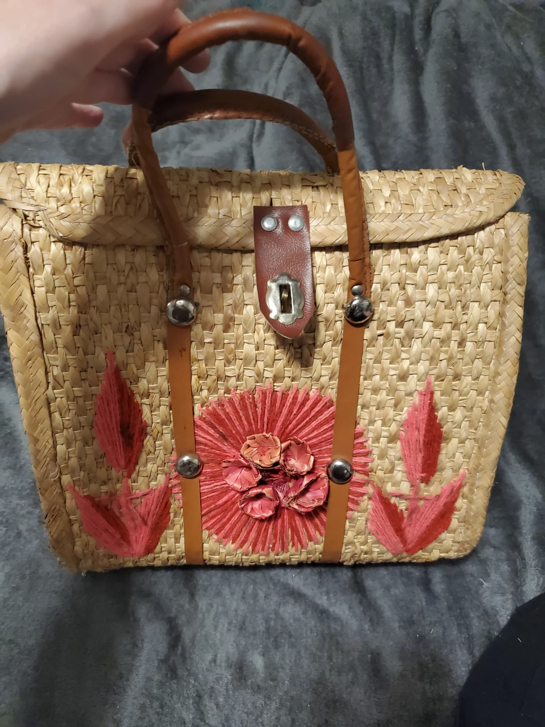 Woven straw purse with floral detail