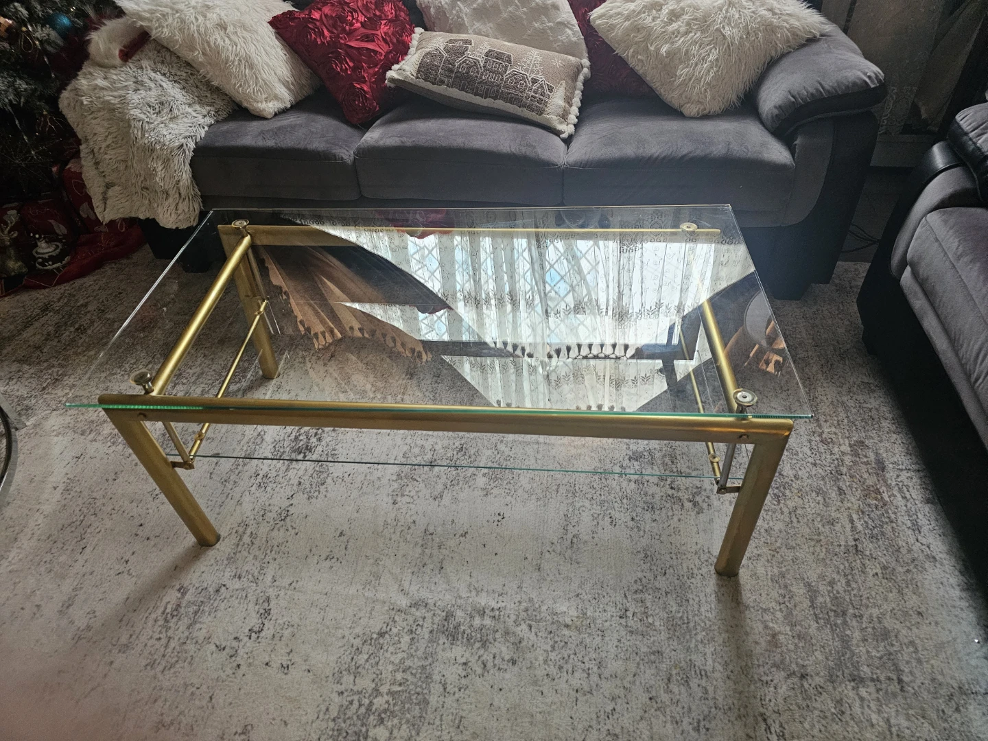Glass coffee table with gold frame