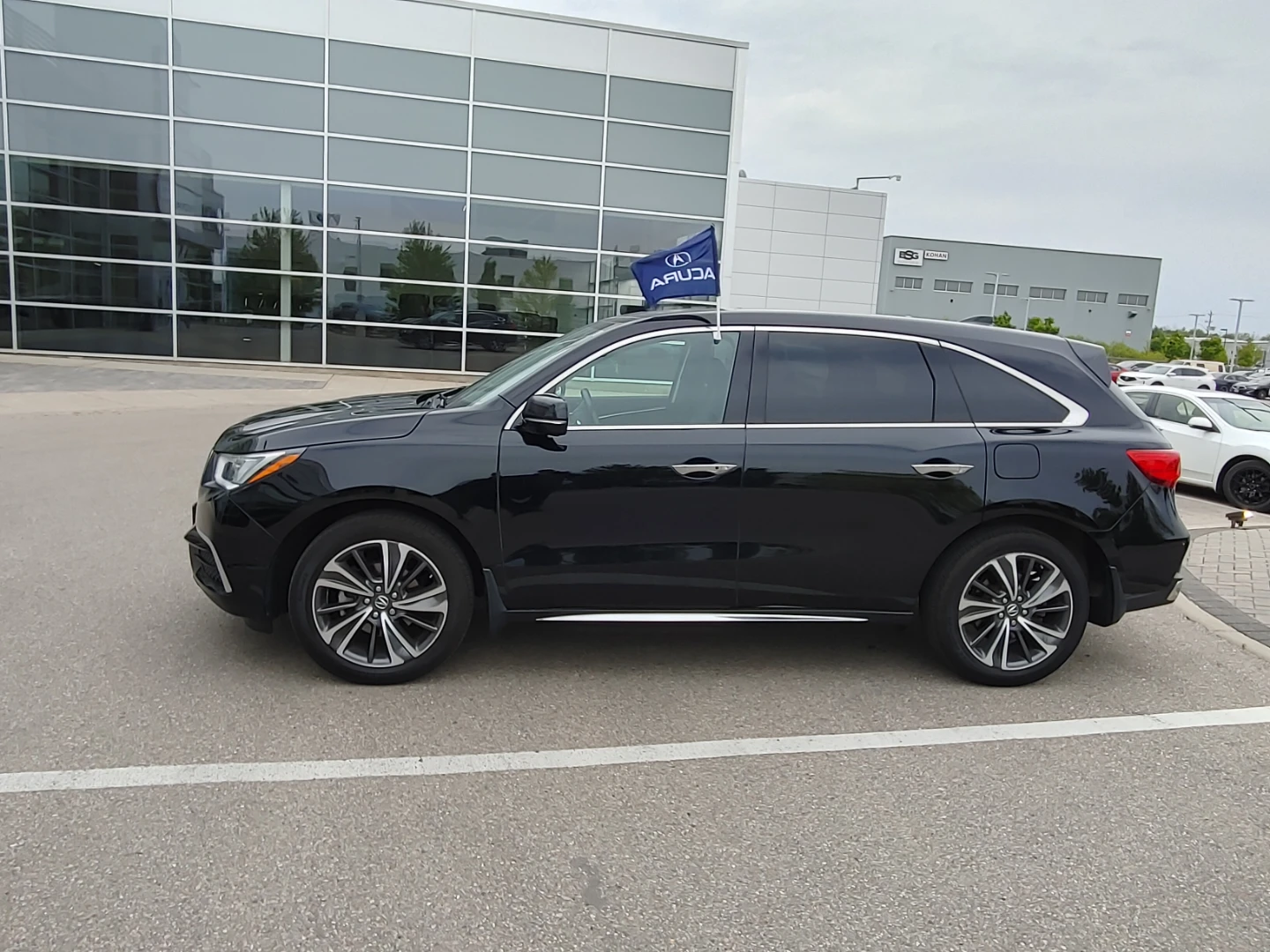 Black Acura MDX SUV - photo 3