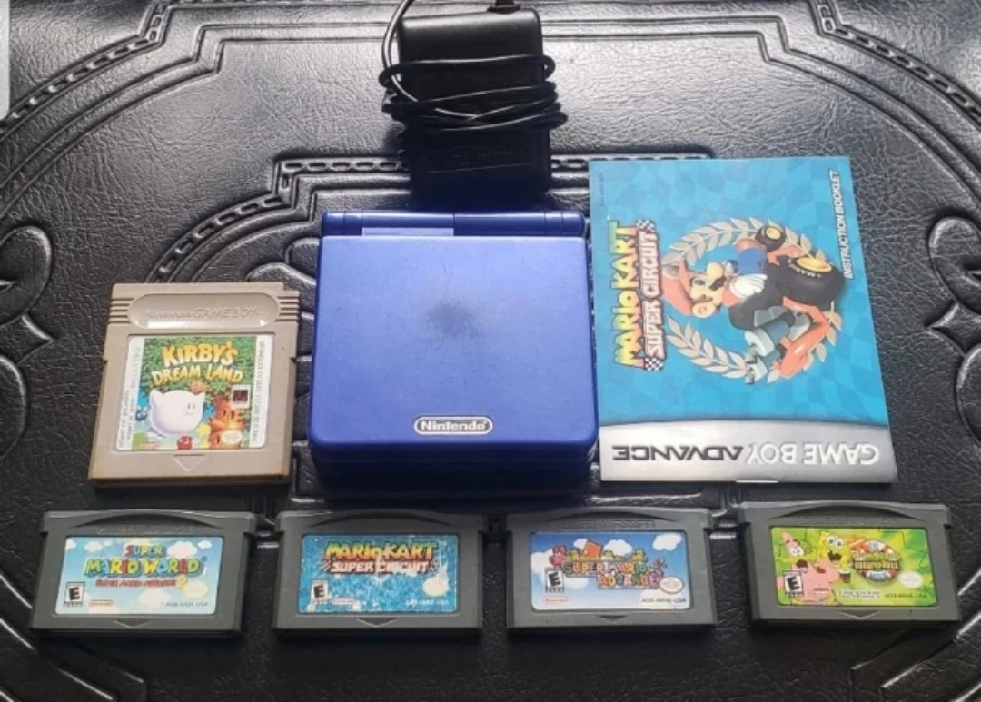 Gameboy Advance SP AGS-001 + 5 games + charger TESTED
