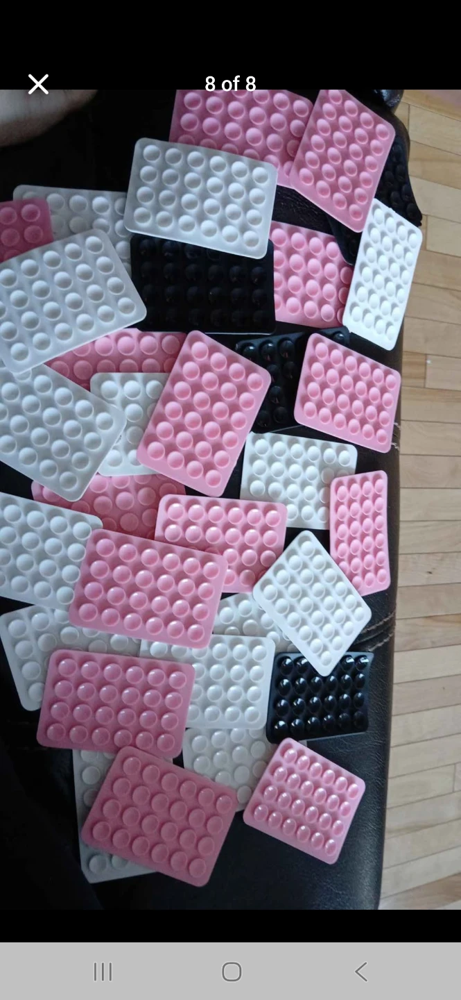 Pink suction cup grips for phones