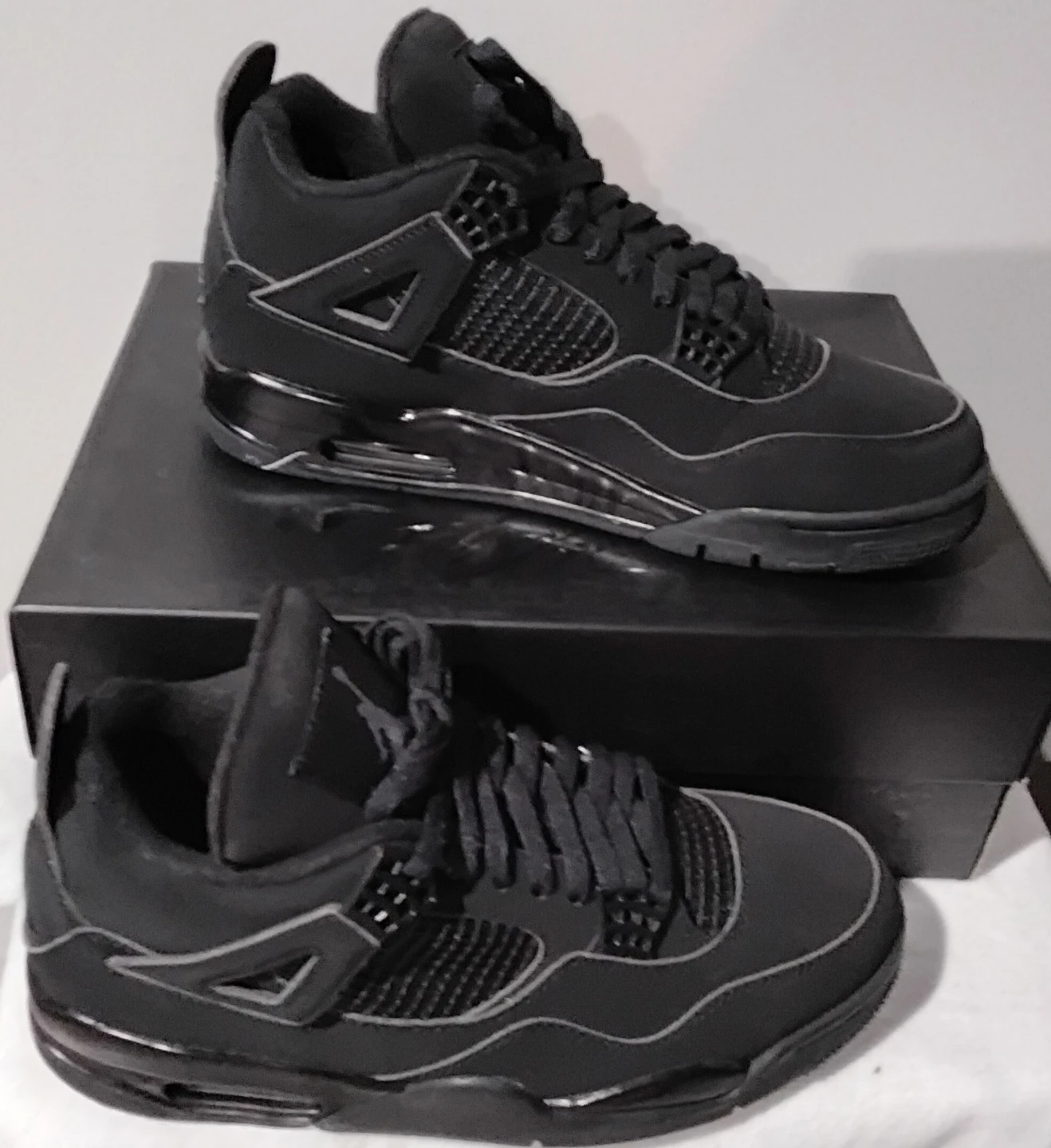 Air Jordan 4 "Black Cat"