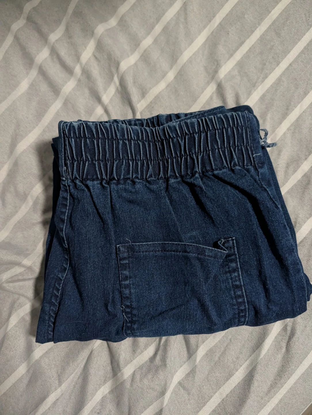 Imported High-Rise Distressed Bootcut Jeans