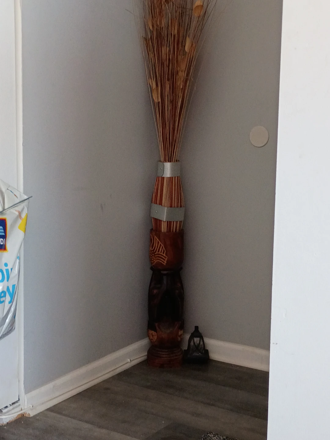 Carved Wooden Floor Vase with Dried Grasses