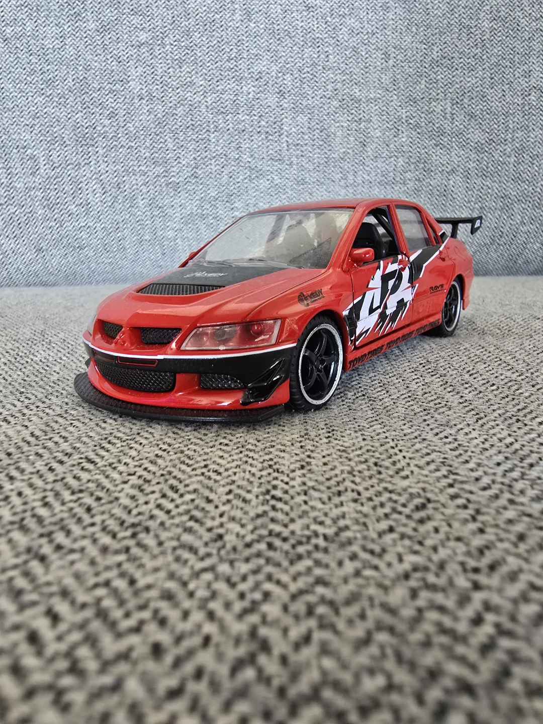 Red Mitsubishi Lancer Evolution VIII Toy Car