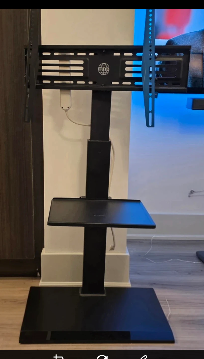 Sleek, Black TV Stand with Shelf