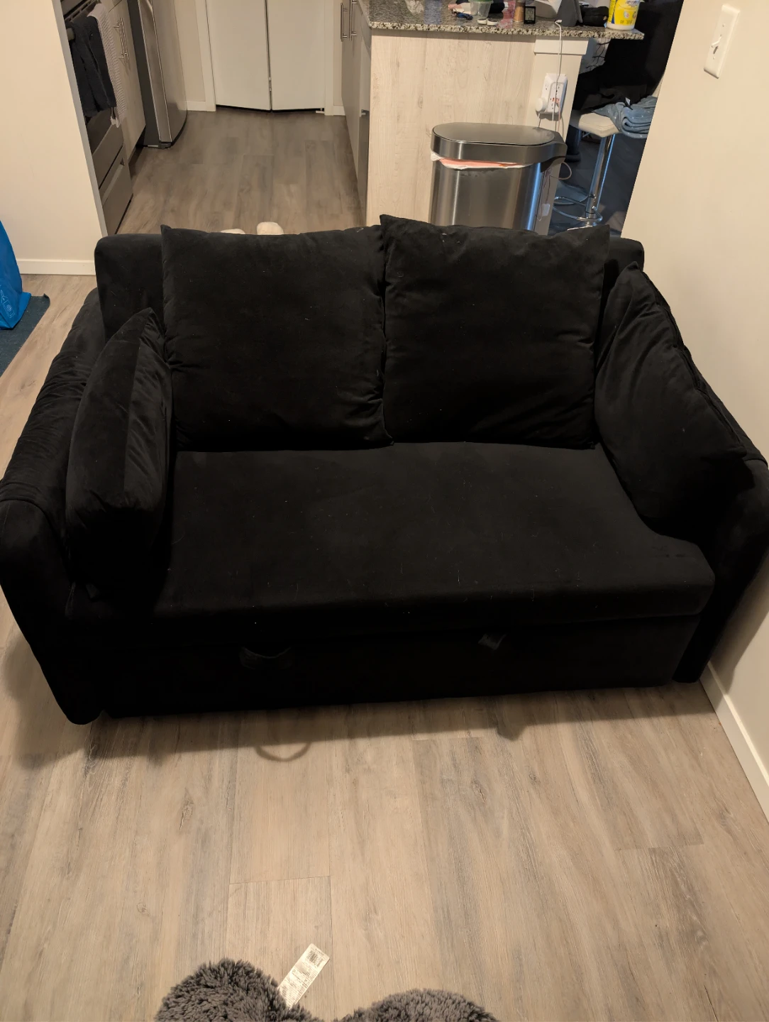 Black Sofa Bed with Pillows