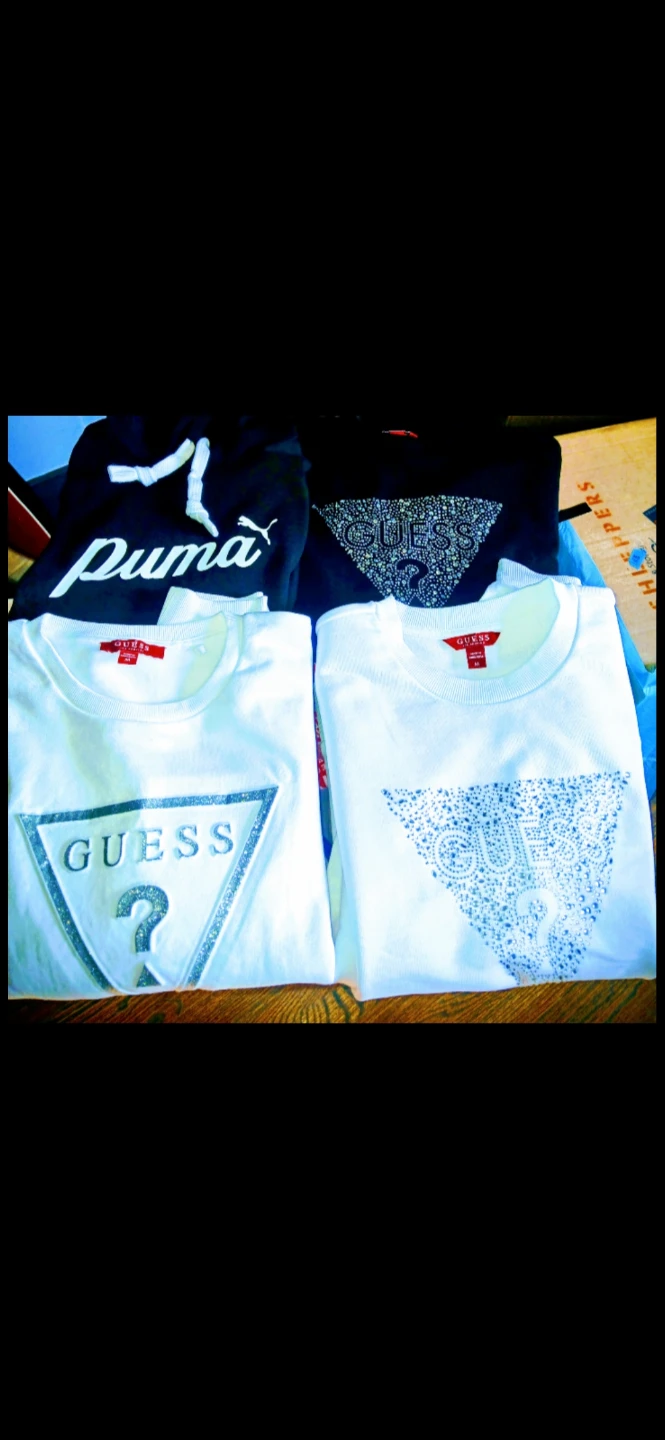 White Guess Logo Sweatshirt $39.99 each