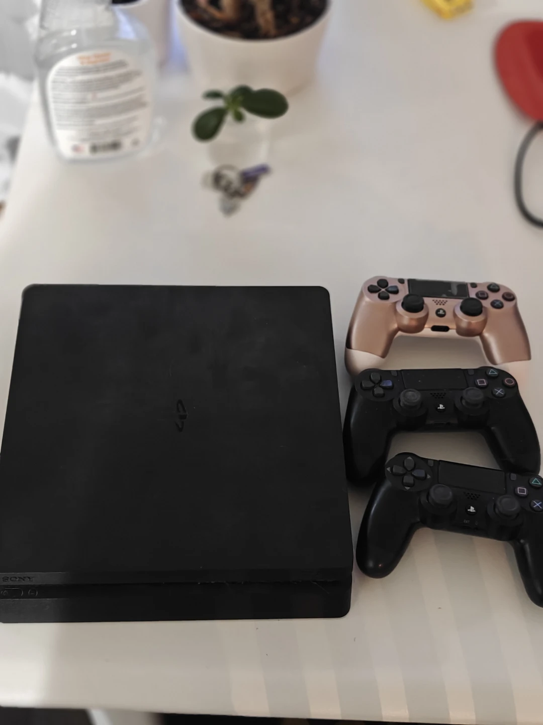 Sony PlayStation 4 Slim Console with 2 Controllers