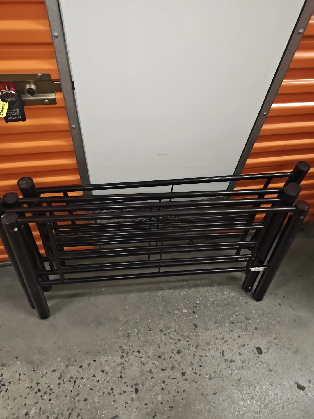 Black metal bedframe