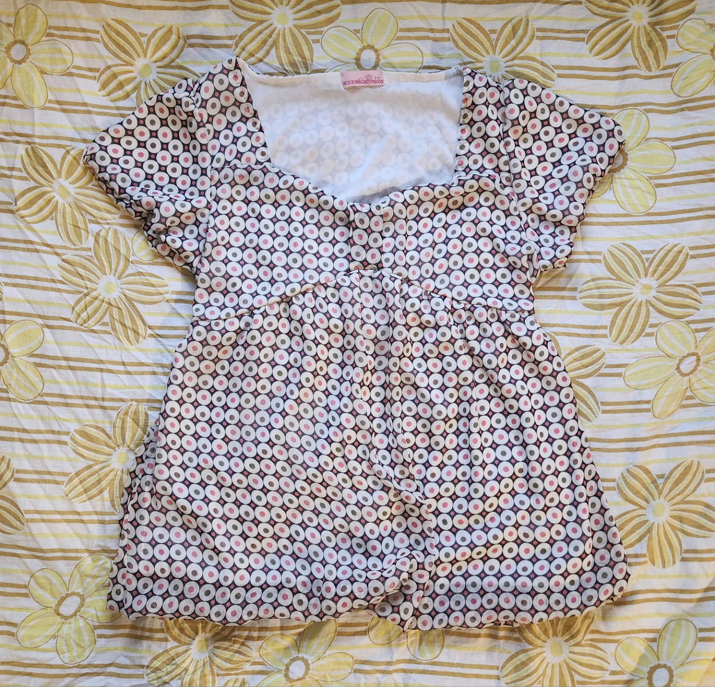 Cute pink and white polka dot babydoll top