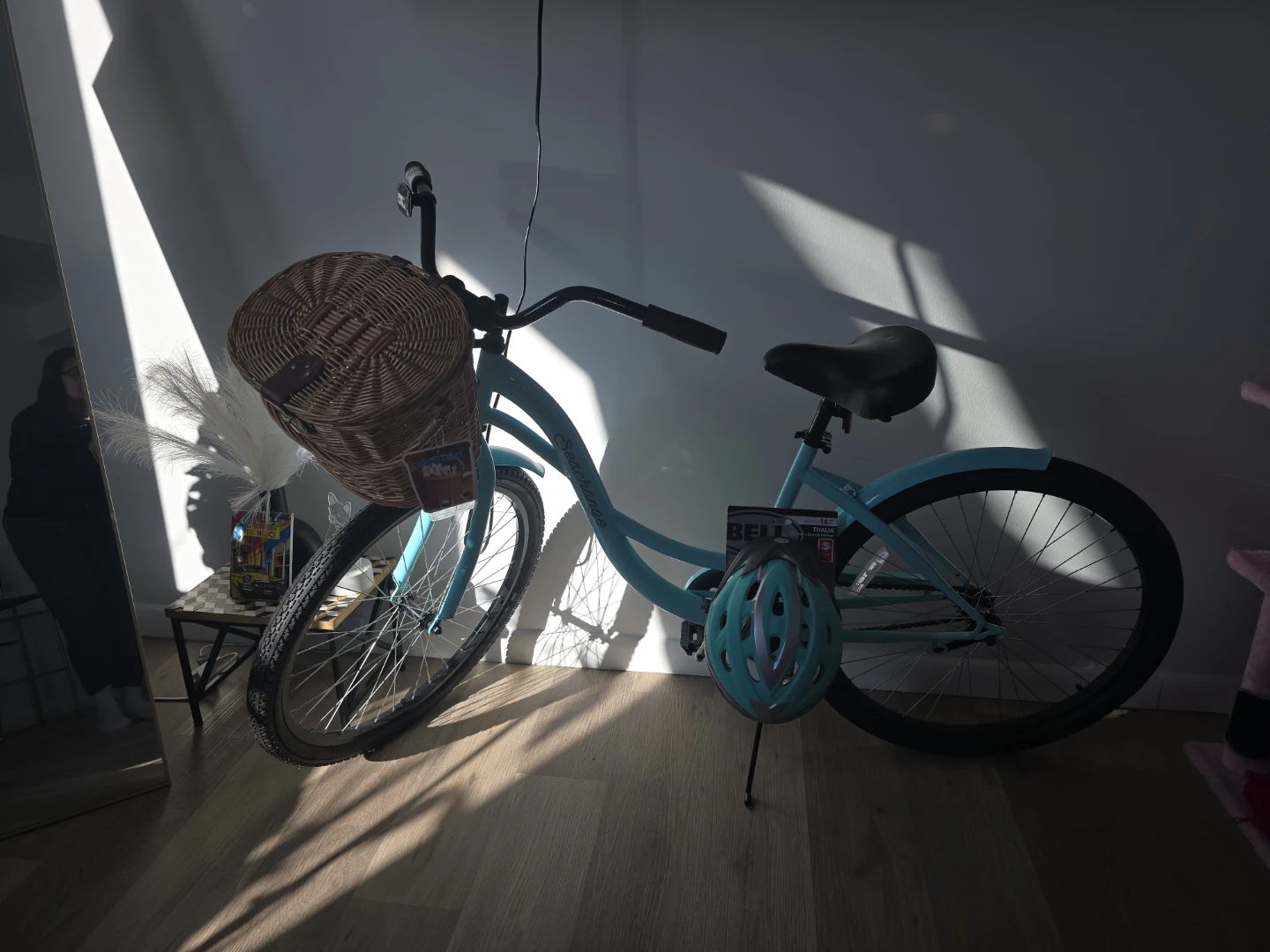 Women's Cruiser Bicycle with Wicker Basket and Bell Helmet