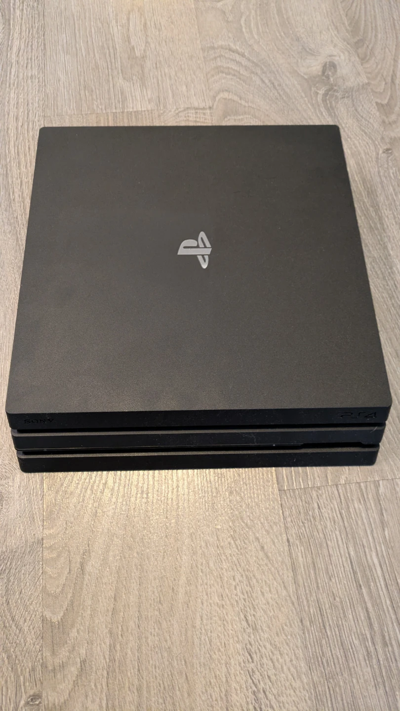 Sony PlayStation 4 Pro Console Bundle with Controller and Games - photo 3
