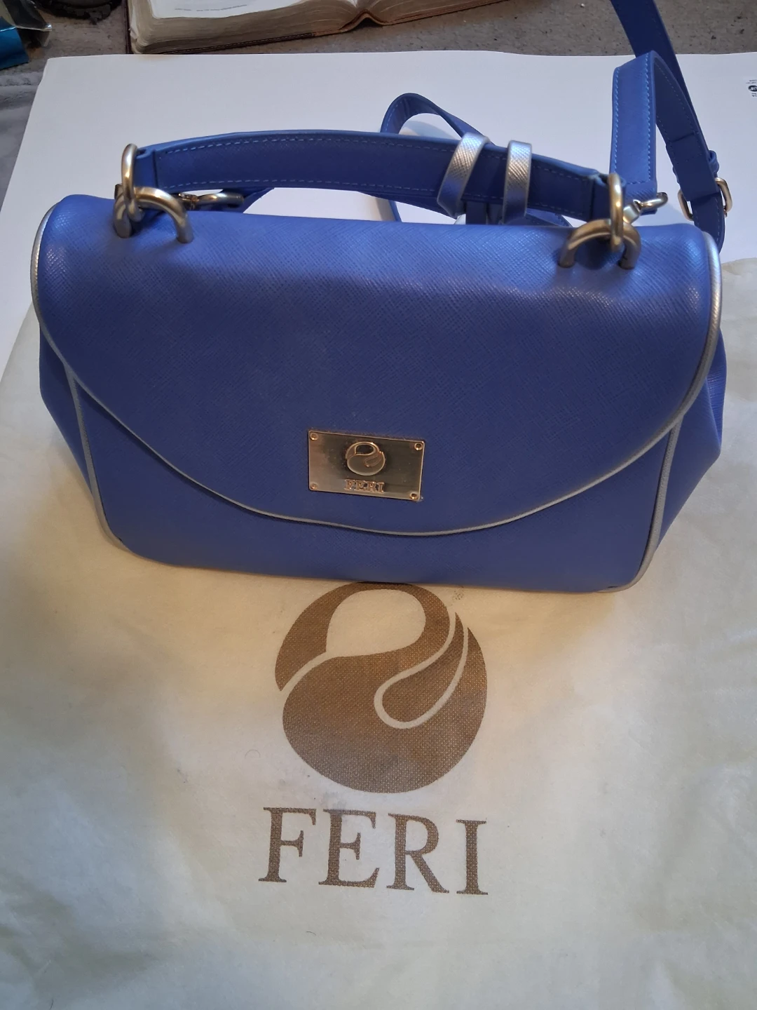 Feri Blue Top Handle Handbag with Tassel