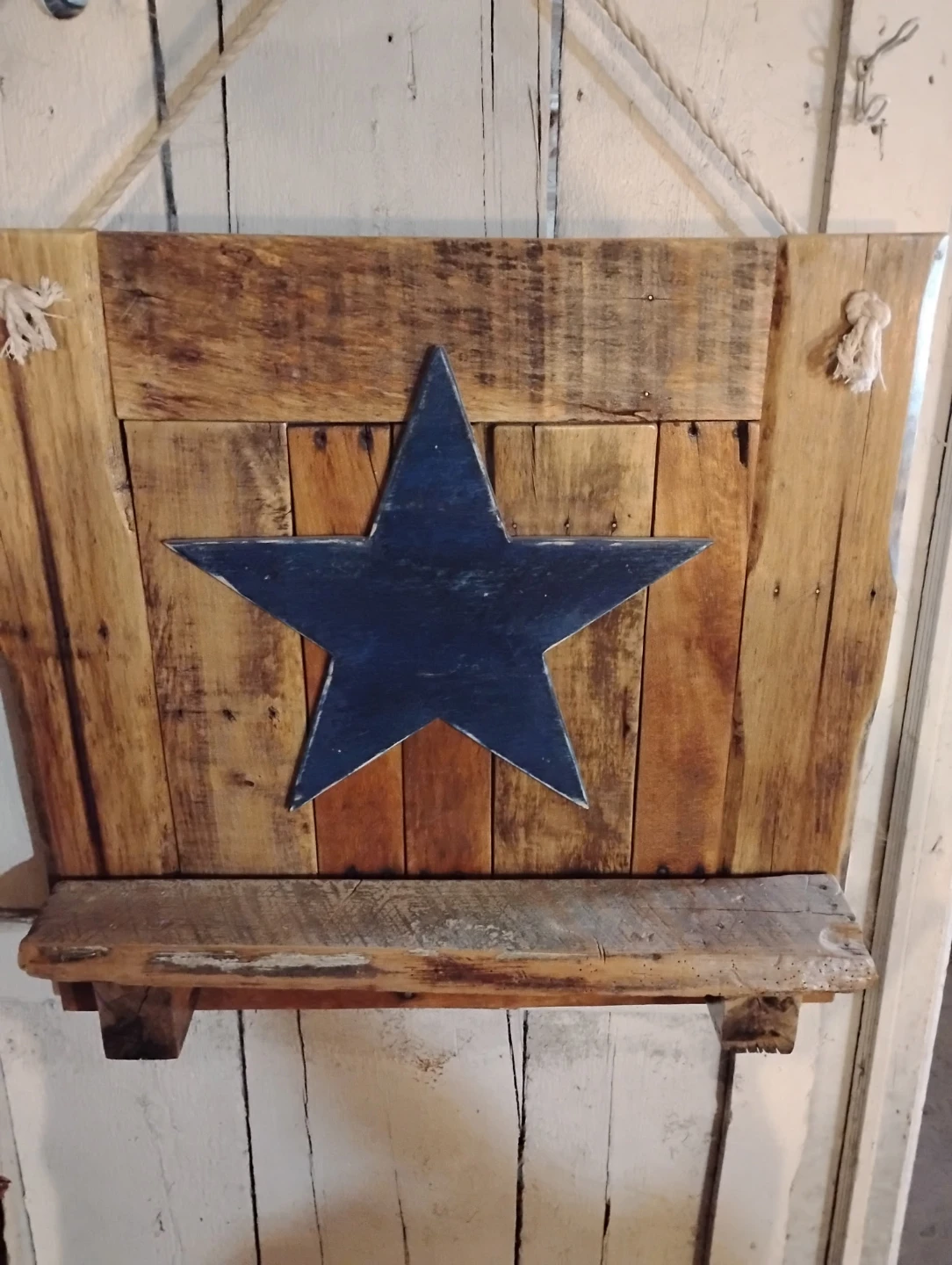 Rustic Wooden Shelf with Blue Star