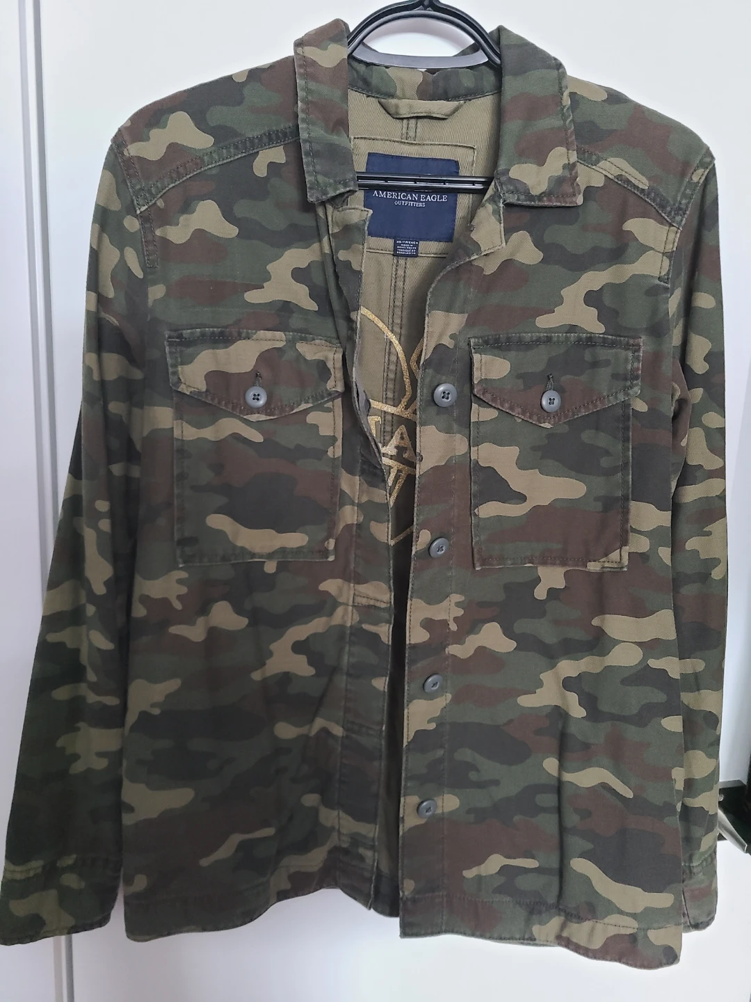 American Eagle Outfitters Camo Jacket with "NAH" Heart Graphic