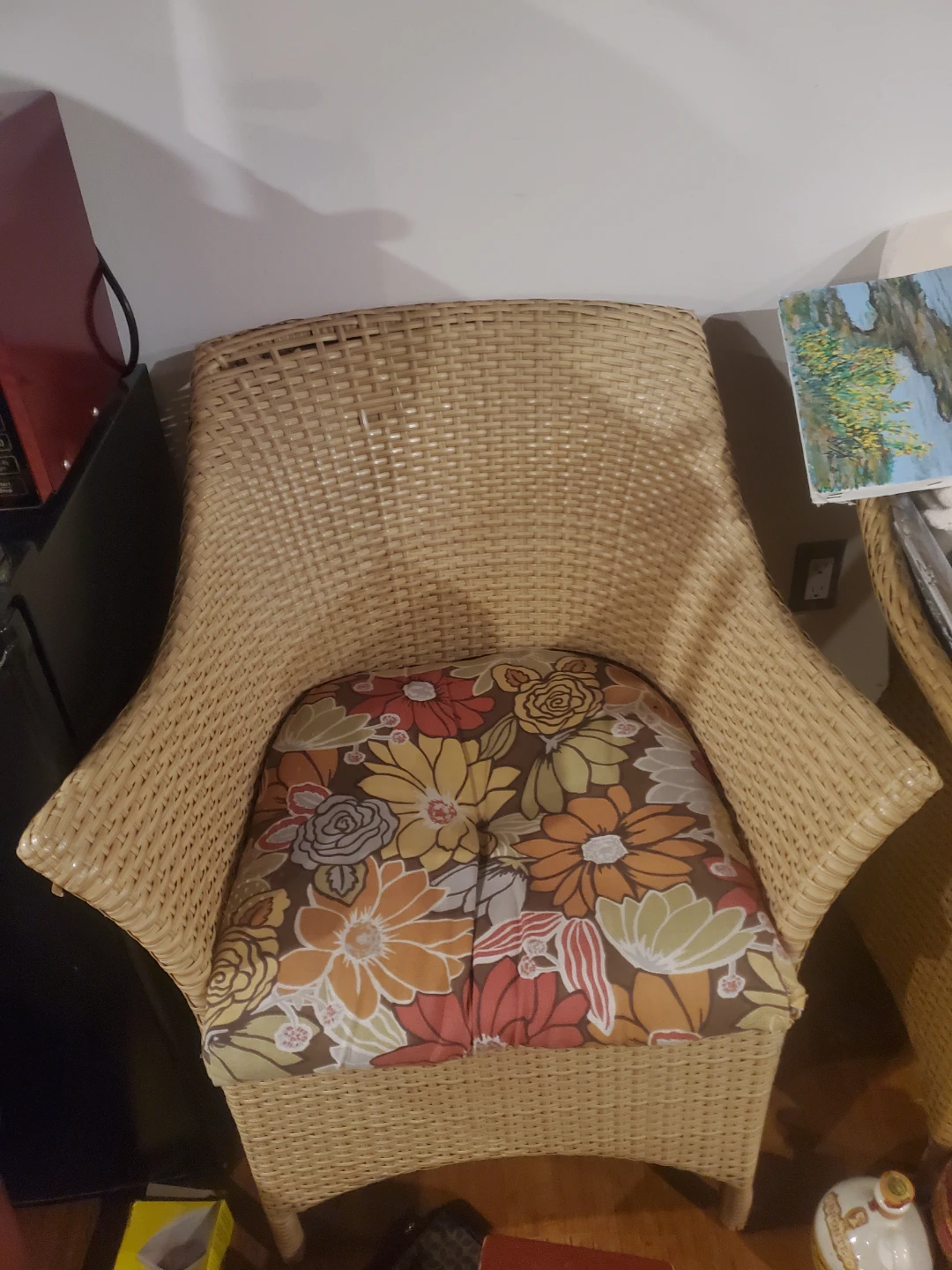 Wicker Armchair with Floral Cushion