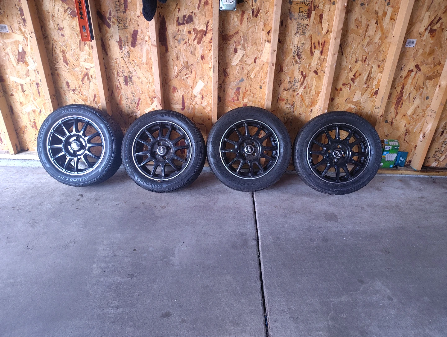 Set of 4 Black Alloy Wheels with Continental Tires