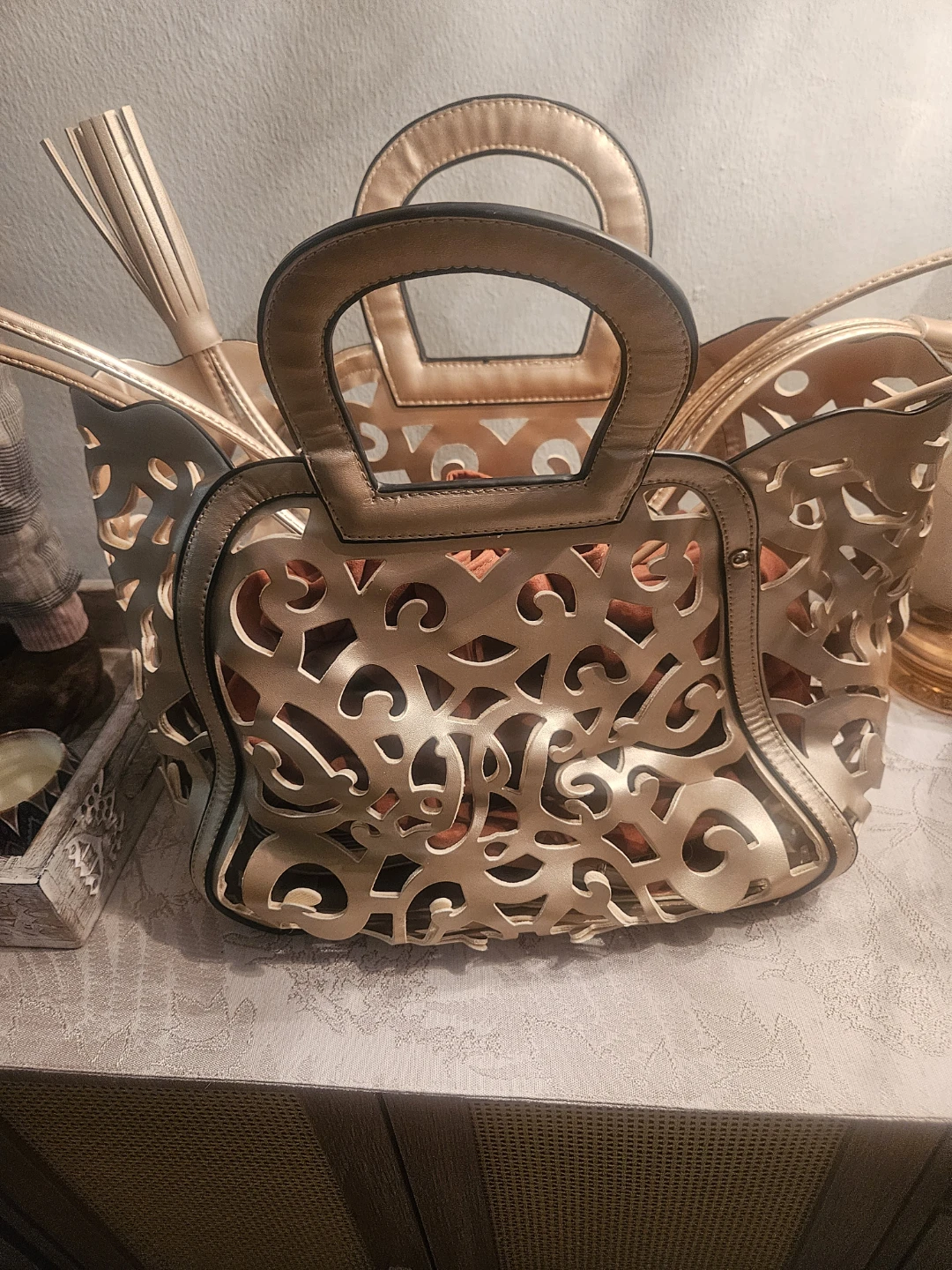 Gold Tone Tote Bag with  laser Cutout Design