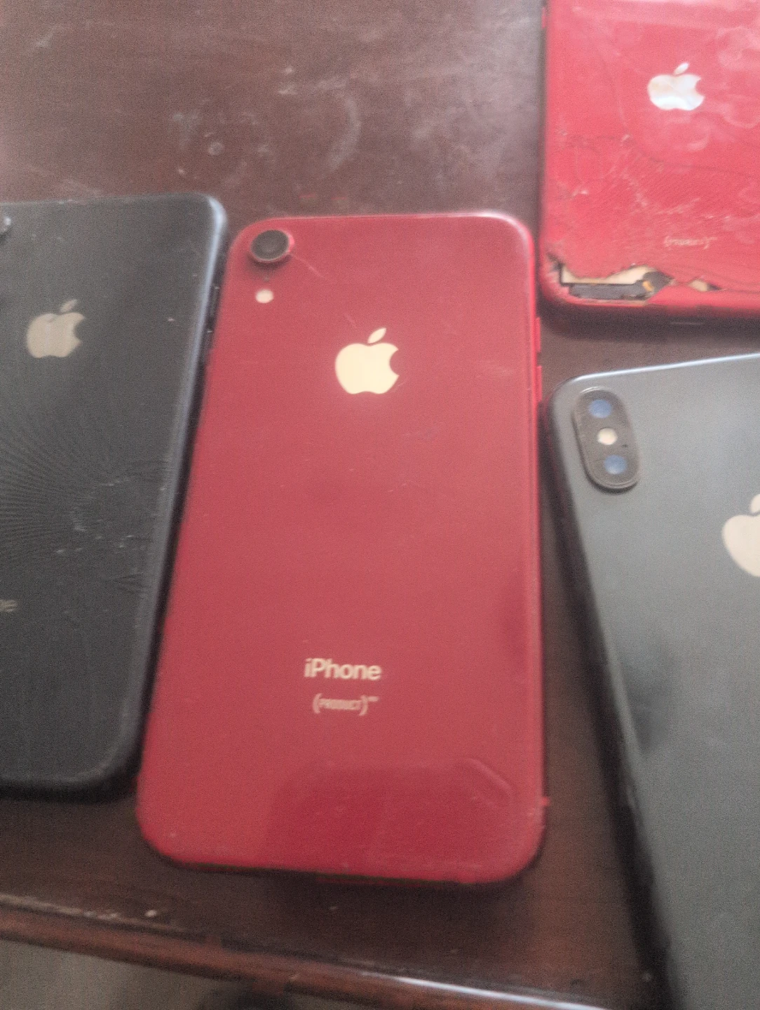 Assorted iPhones (Red, Black, White) - photo 3