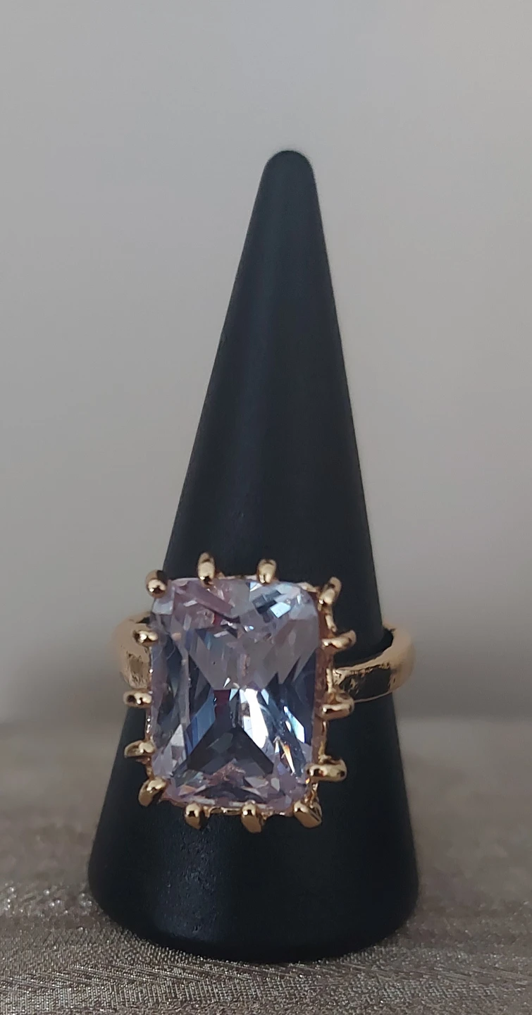 Gold-tone ring with large square clear stone