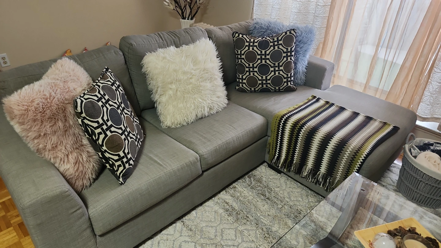 Grey Sectional Couch with Decorative Pillows