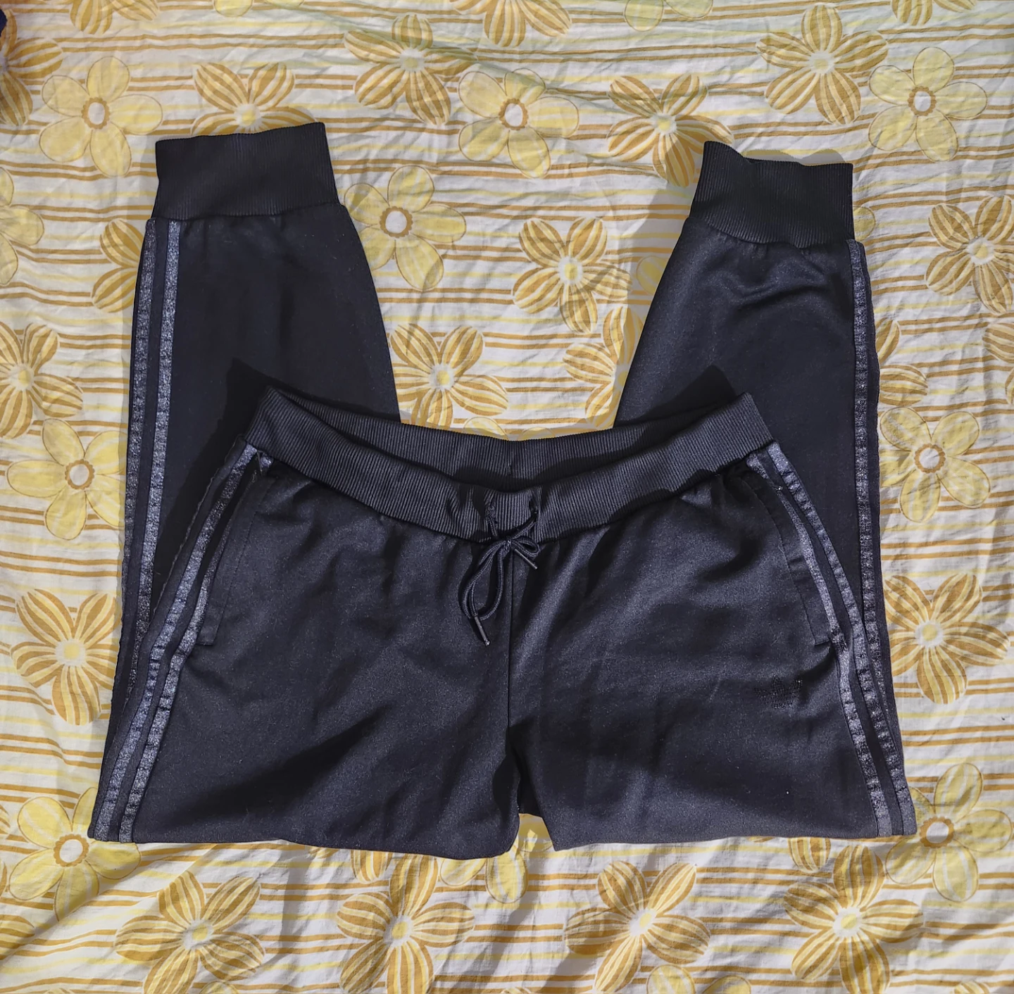 Black Adidas joggers with silver sparkle stripes