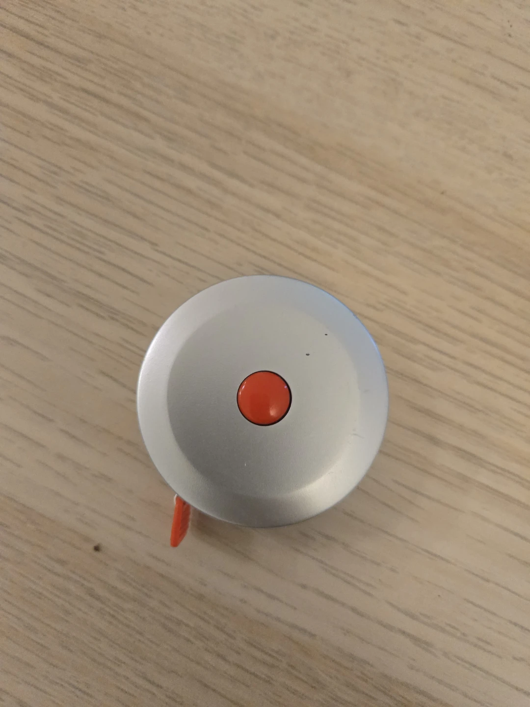 Silver Retractable Measuring Tape with Red Button