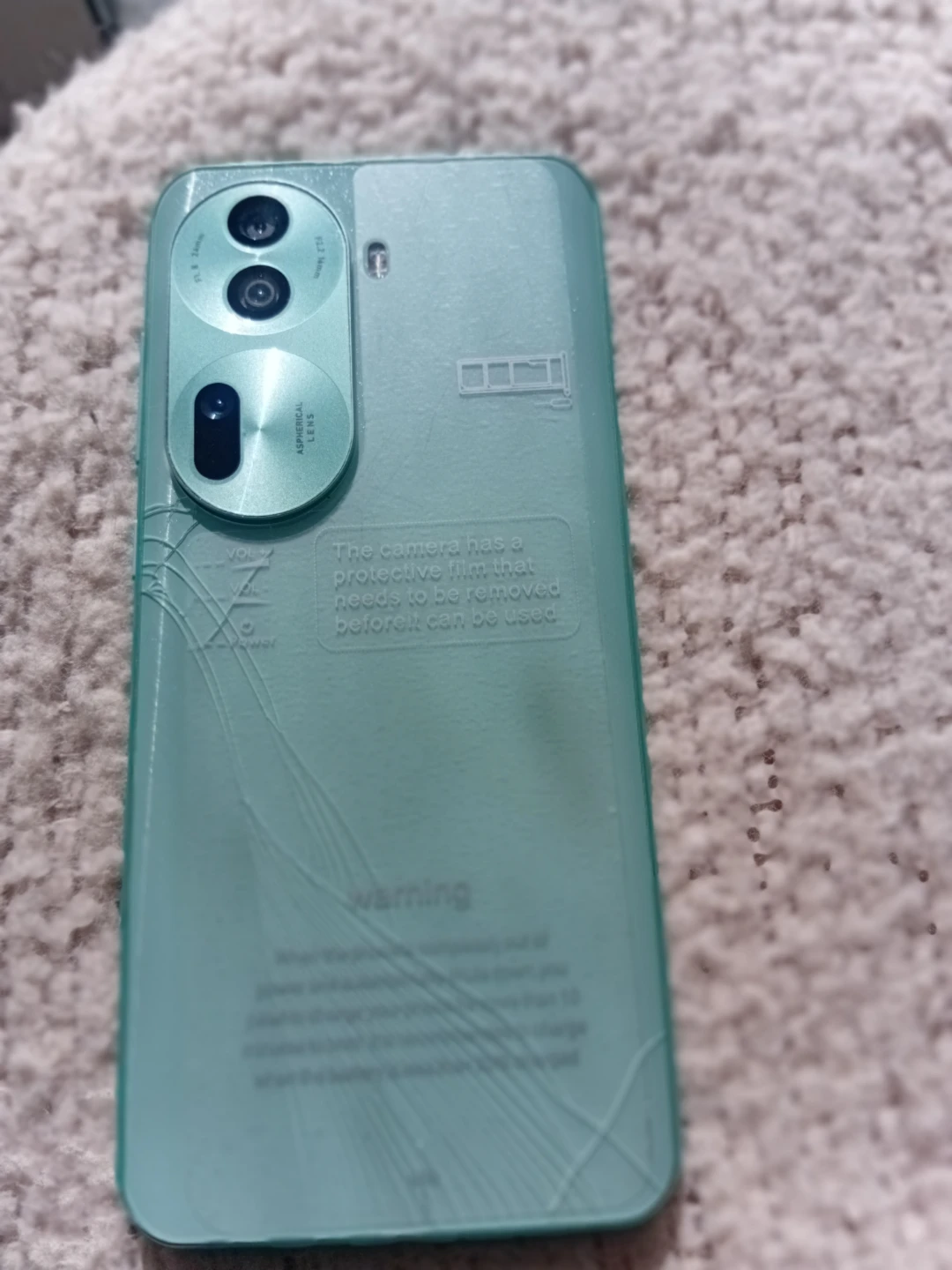Green Smartphone with Cracked Screen - photo 2