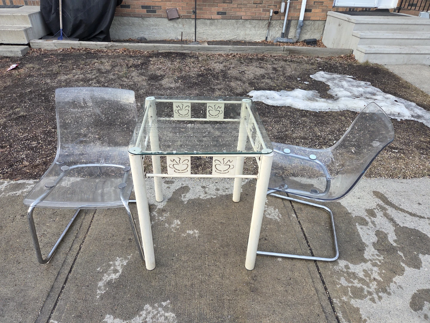 Glass patio table and Plastic Chairs set