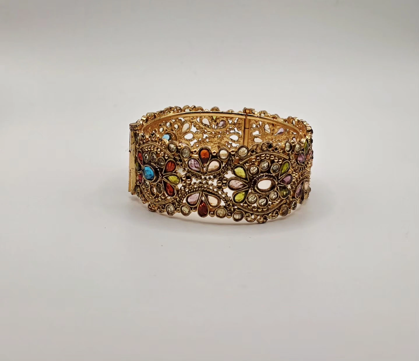Ornate Gold-Tone Bangle Bracelet with colourful gems