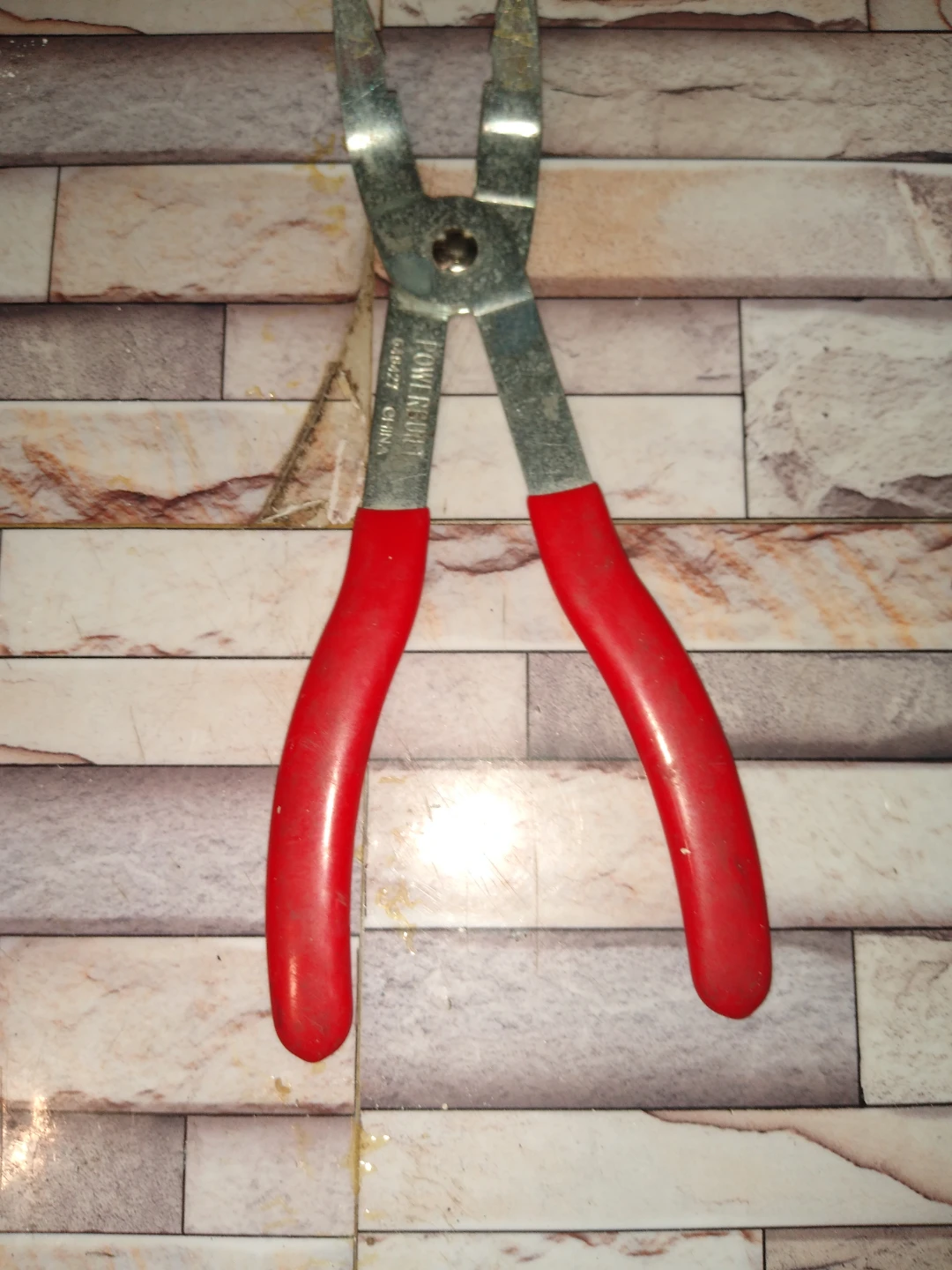 Spark plug wire boot pliers