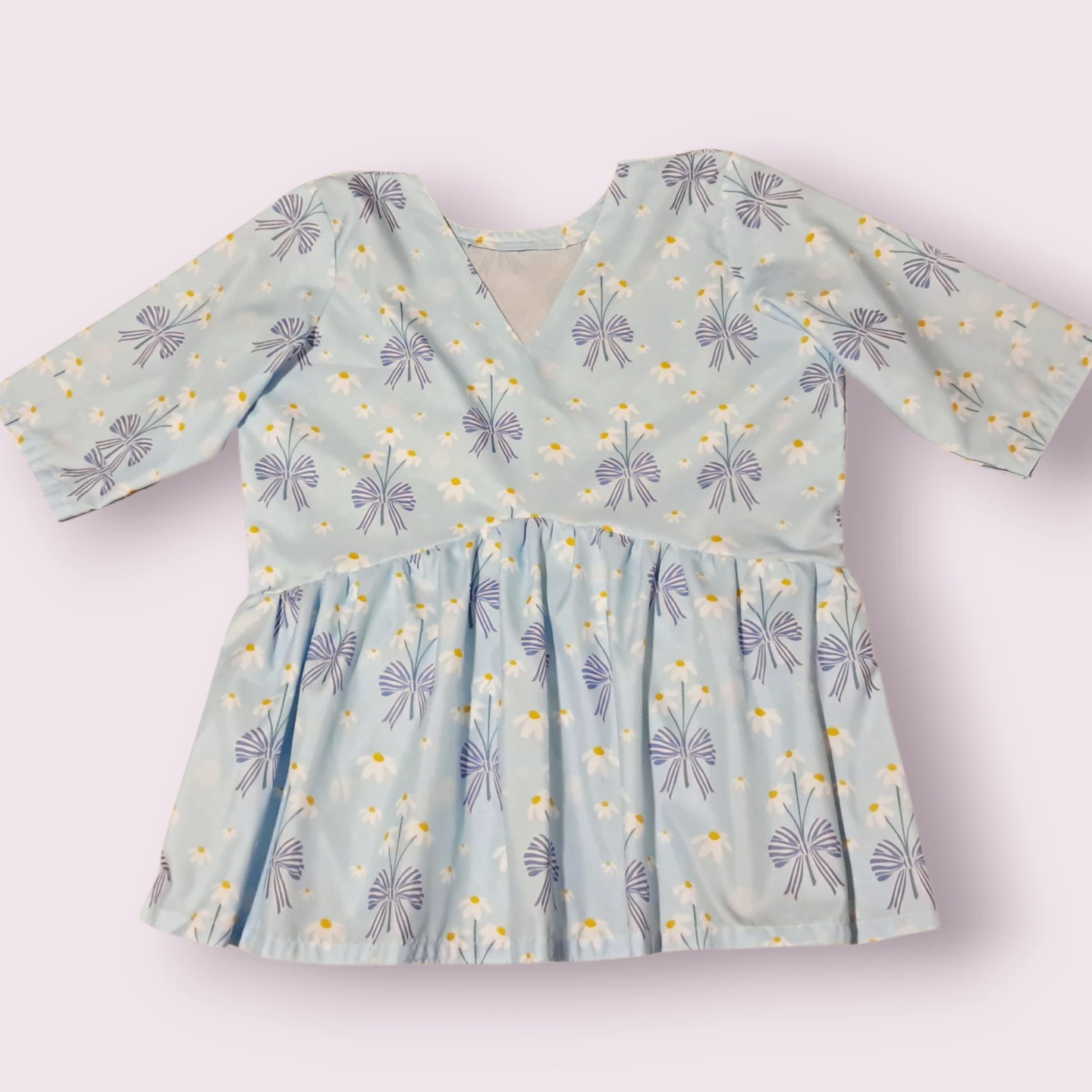 Light Blue Peplum Top with Daisy Print - Size Medium