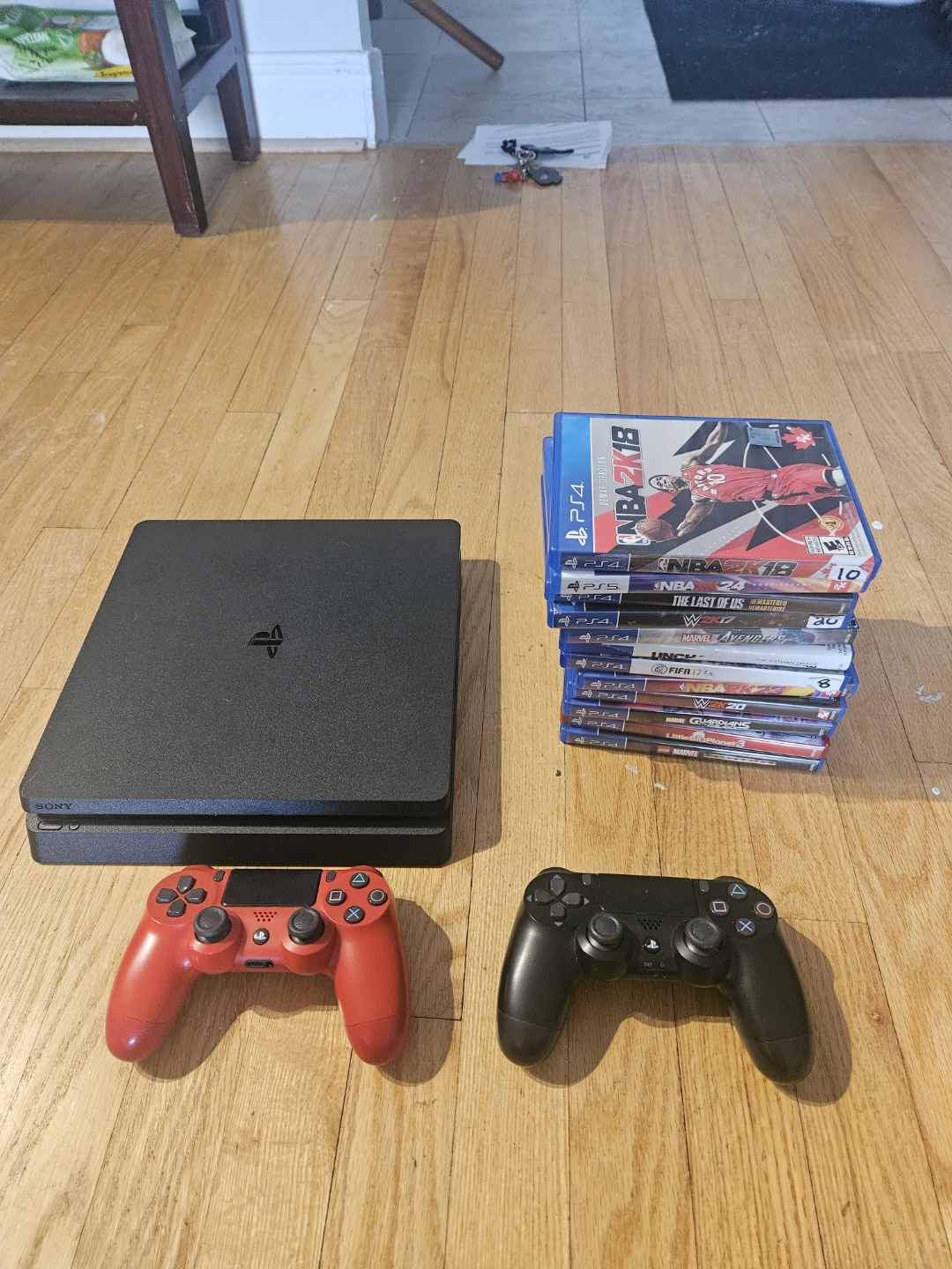 Sony Slim PlayStation 4 Console with 2 Controllers and Games
