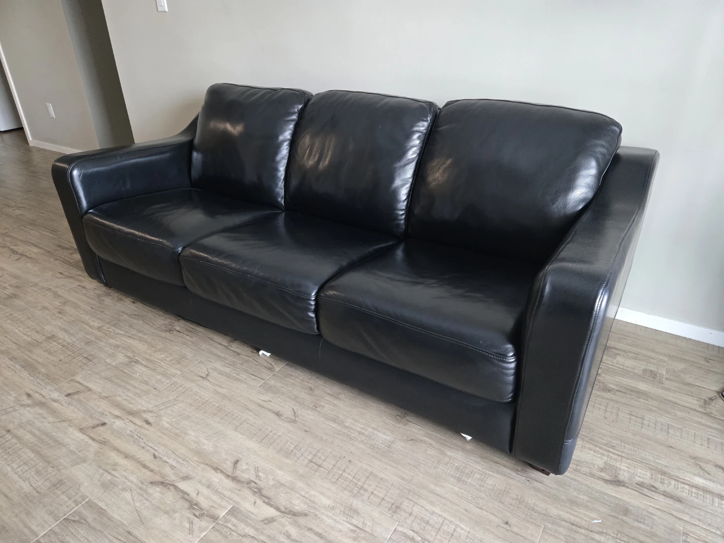 Black Leather Sofa - Three seater