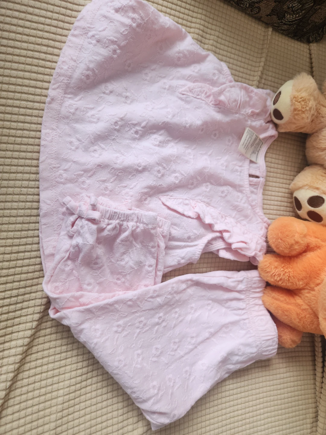 Pink embroidered baby pyjamas