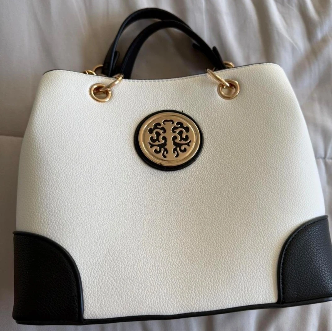 White and Black Handbag with Gold Accents